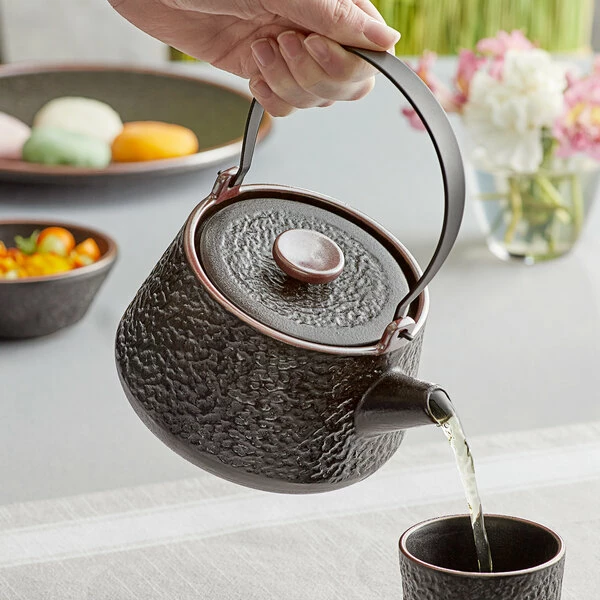 Acopa Heika 24 Oz. Black Matte Textured Stoneware Teapot With Lid 1 Acopa Heika 24 Oz. Black Matte Textured Stoneware Teapot With Lid